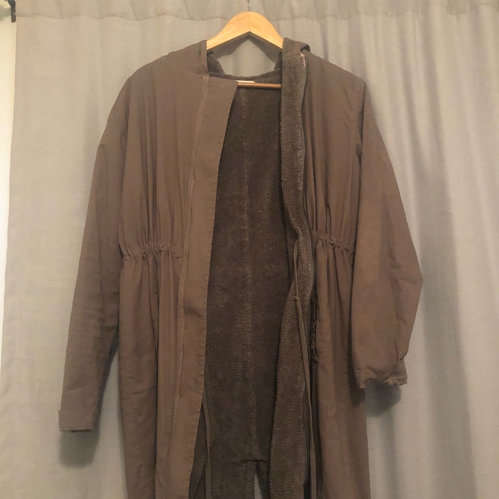 Soft, cozy and flattering trench coat.